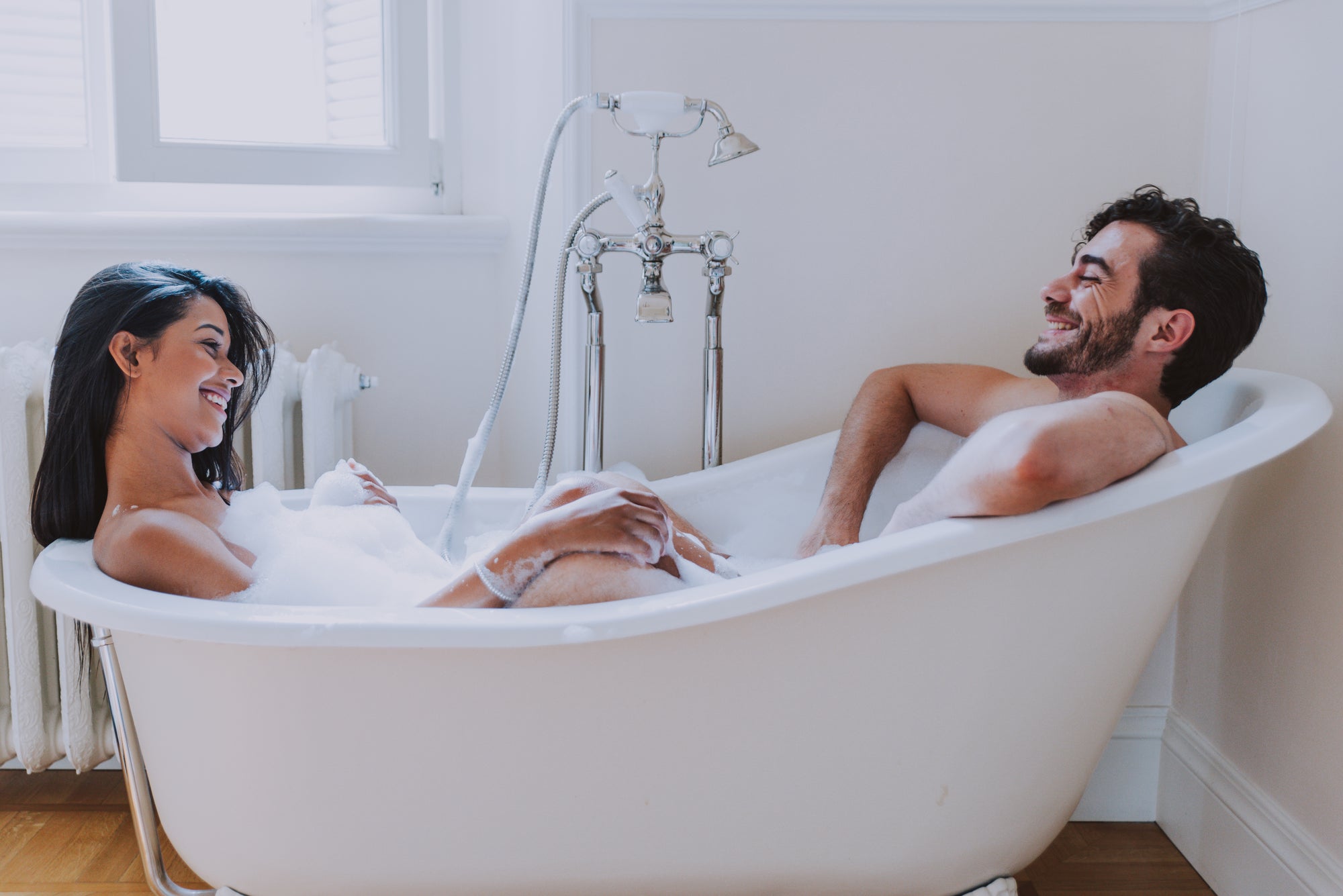 Man and woman in bubble bath